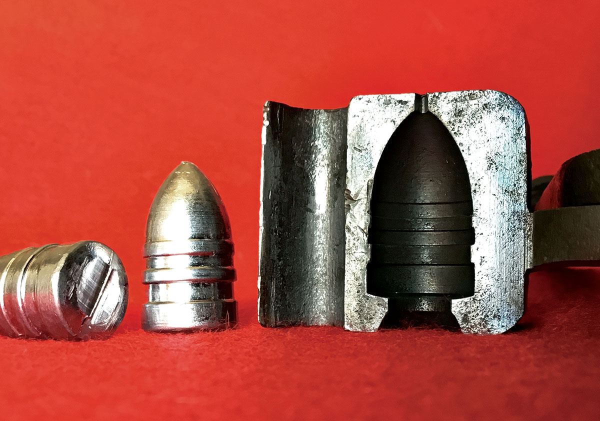 Note the tapered shape of the bullet and the slight lead ridge left on the base from trimming the sprue with the built-in pincers. Also, note the excessive diameter of the sprue channel in the mould. The air-bleed channel at the very tip of the bullet cavity was probably added by someone after it left the factory.